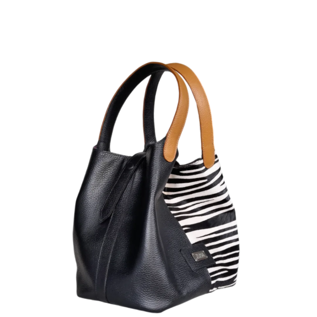 Bolso en cuero para mujer color negro con pelo cebra blanco por negro