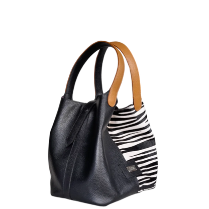Bolso en cuero para mujer color negro con pelo cebra blanco por negro