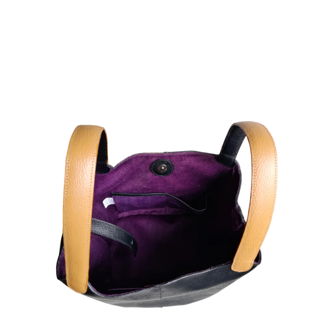 Bolso en cuero para mujer color negro con pelo cebra blanco por negro