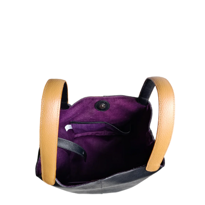 Bolso en cuero para mujer color negro con pelo cebra blanco por negro