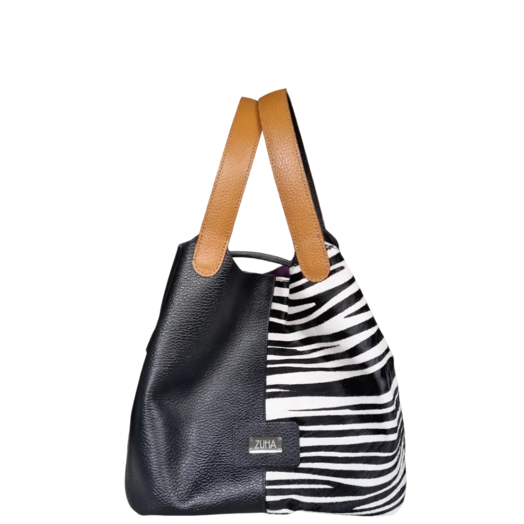 Bolso en cuero para mujer color negro con pelo cebra blanco por negro