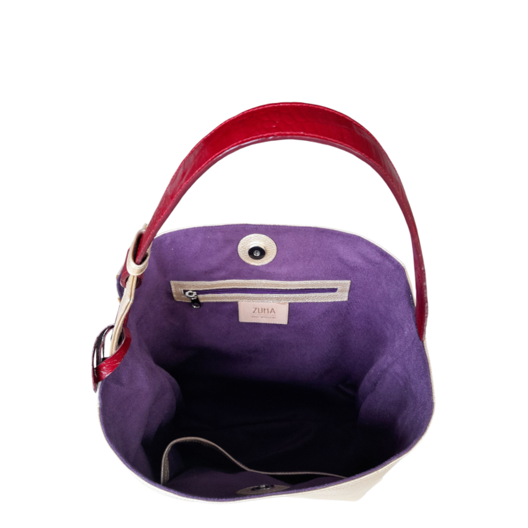 Bolso en cuero para mujer en color oro y cebra