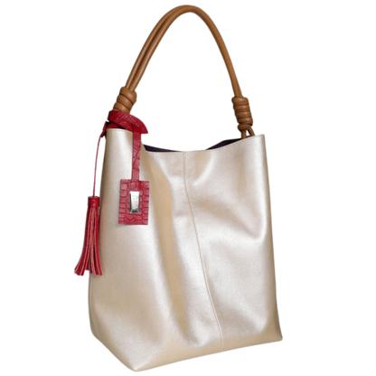 Bolso en cuero para mujer color oro