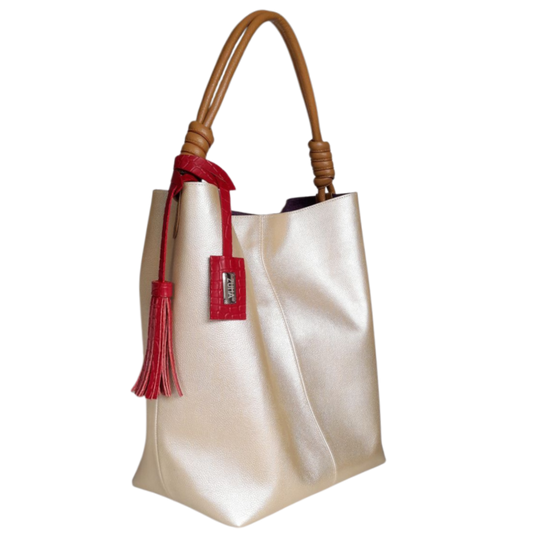 Bolso en cuero para mujer color oro